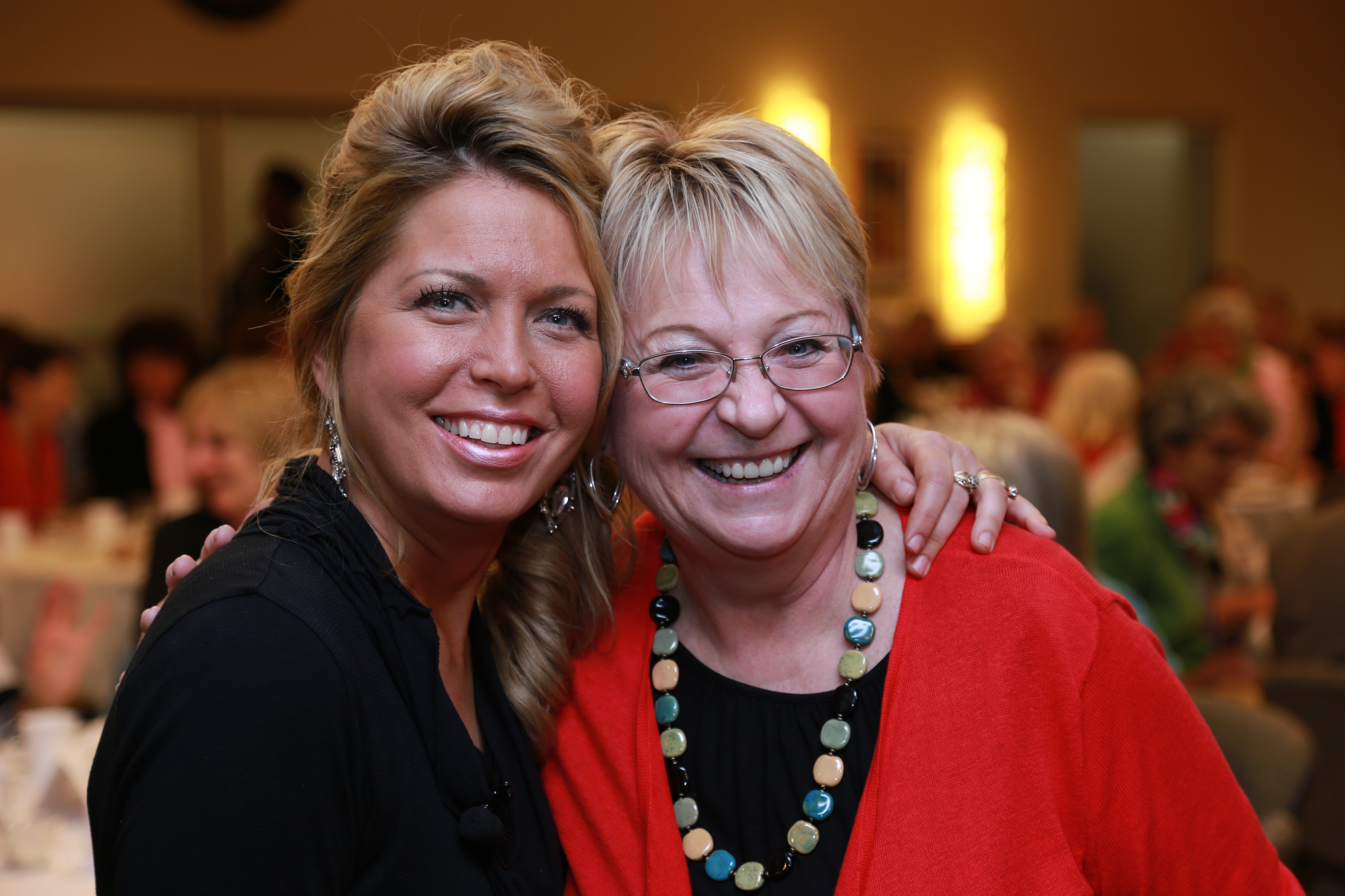 Heidi Marble, breast cancer survivor speaker with happy client
