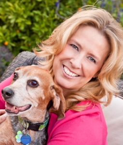 Teresa Rhyne, breasat cancer survivor speaker, with her cancer survivor beagle
