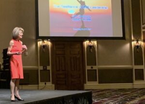 Diane Sieg speaking at a nursing conference on resilience and well being for healthcare professionals