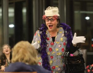 Aunt Lena mesmerizing the crowd with her humor and antics